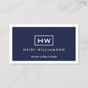 box logo with two initials monogram on dark blue business card