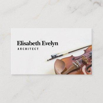 close-up of violin string with bow on white business card