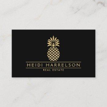 elegant golden pineapple logo on black business card