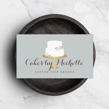 elegant white cake with florals cake decorating business card