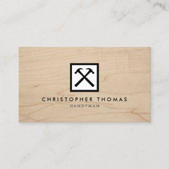handyman, carpenter, builder white logo on wood business card