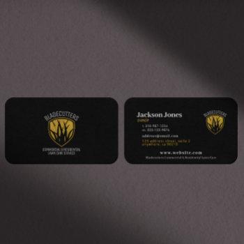 Small Lawn Mower Gold Grass Emblem Black Business Cards Front View