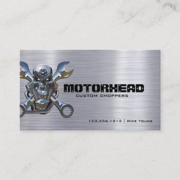 metalwork skull and wrench on brushed aluminum business card