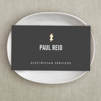 modern electrician gold lightning bolt logo black business card