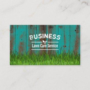 professional lawn care & landscaping teal wood business card