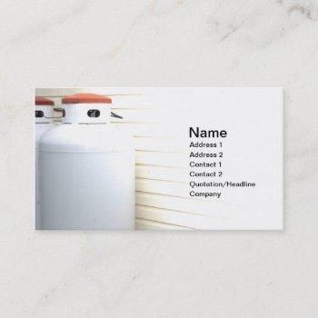 two large outdoor gas or propane tanks business card