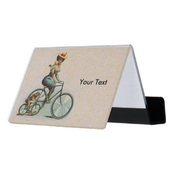 victorian lady hat riding bicycle beside bulldog desk business card holder