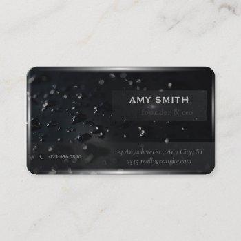 water droplets on the background of black space business card